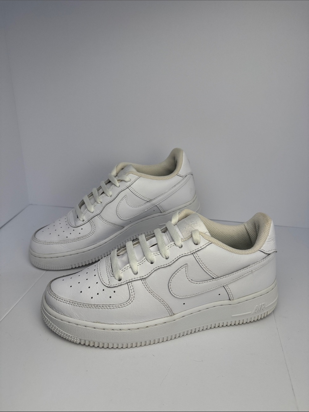 Nike Air Force One Low-Top Triple White Leather Sneakers